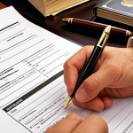 **Preparing a legal document:** A well-organized desk with legal documents (plaint, reply), a pen, and a law book. Focus on the importance of careful document preparation in litigation.